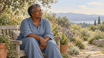 Illustration of an adult with short grey curls and glasses resting on a wooden bench beside a flowering garden path.