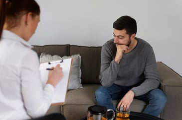 a man having evaluation by therapist